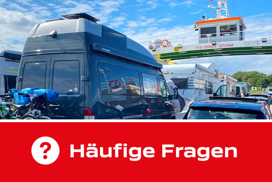Frequently asked questions, in the background the "Ernst Sturm" loaded with vehicles  